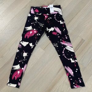 NWT…Justice splatter pattern leggings